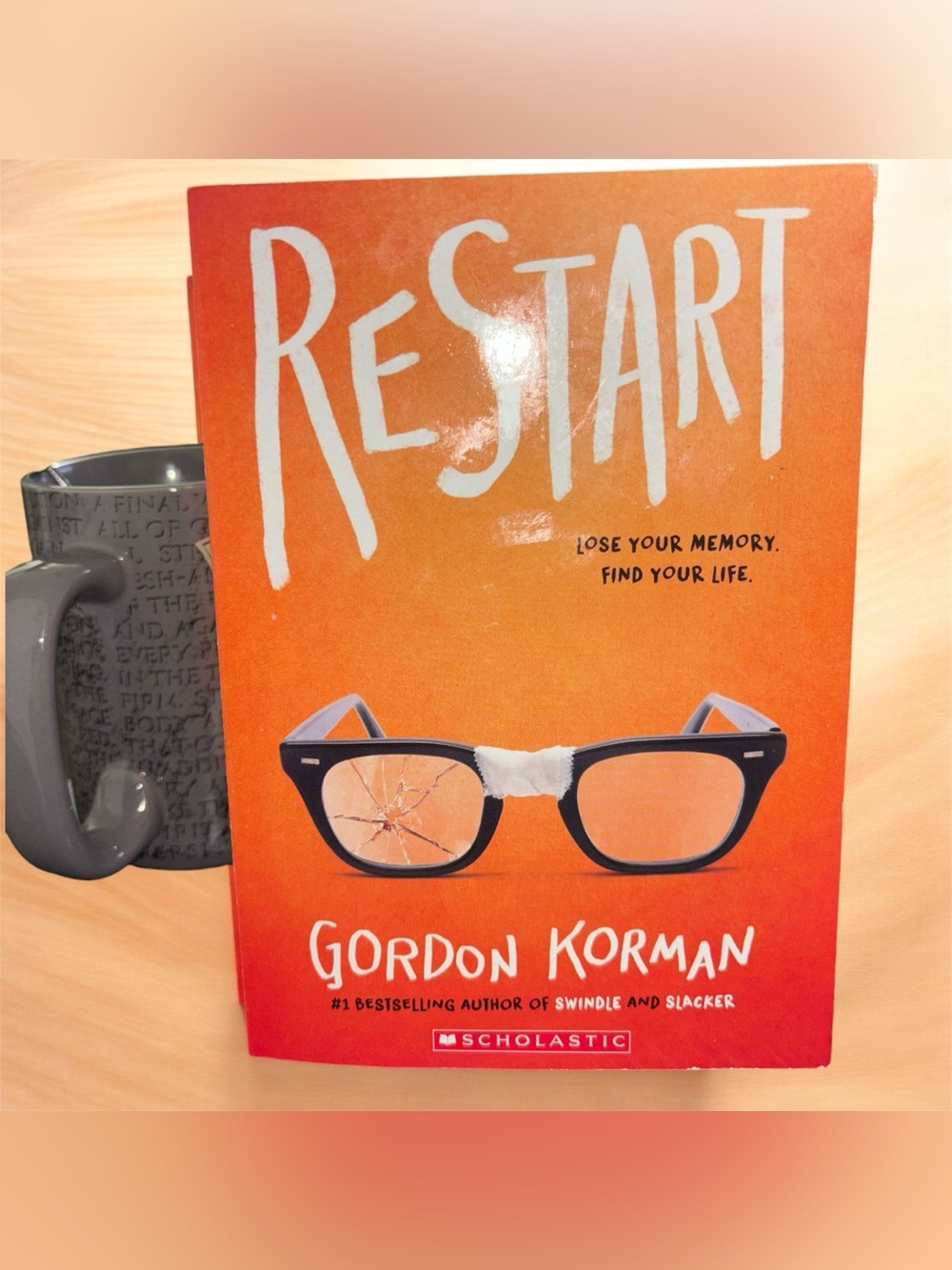 Restart by Gordon Korman - Orange Paperback